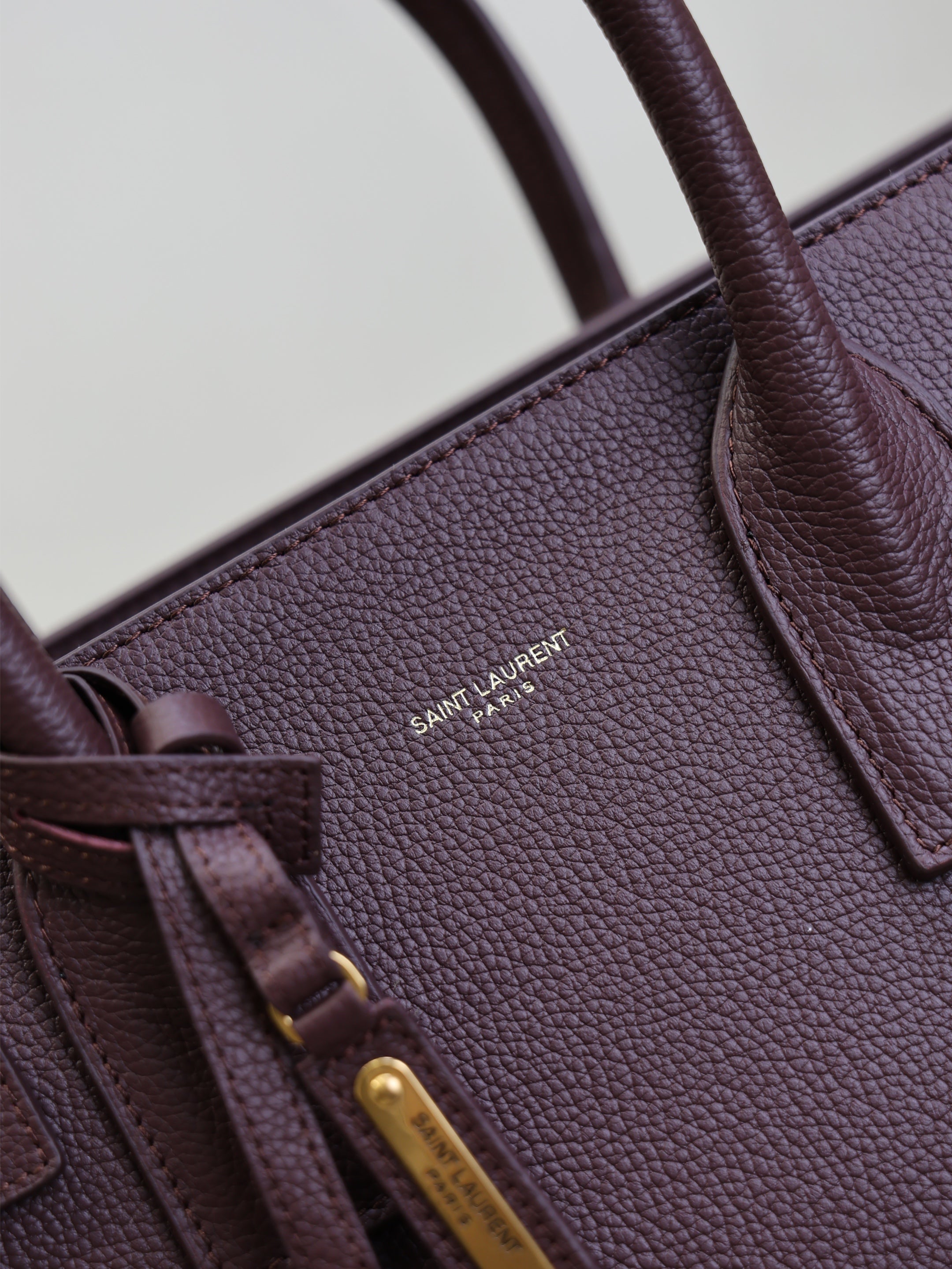 YSL 25S SAC DE JOUR GM 32 IN ROUGE CABERNET SUPPLE GRAINED CALFSKIN
