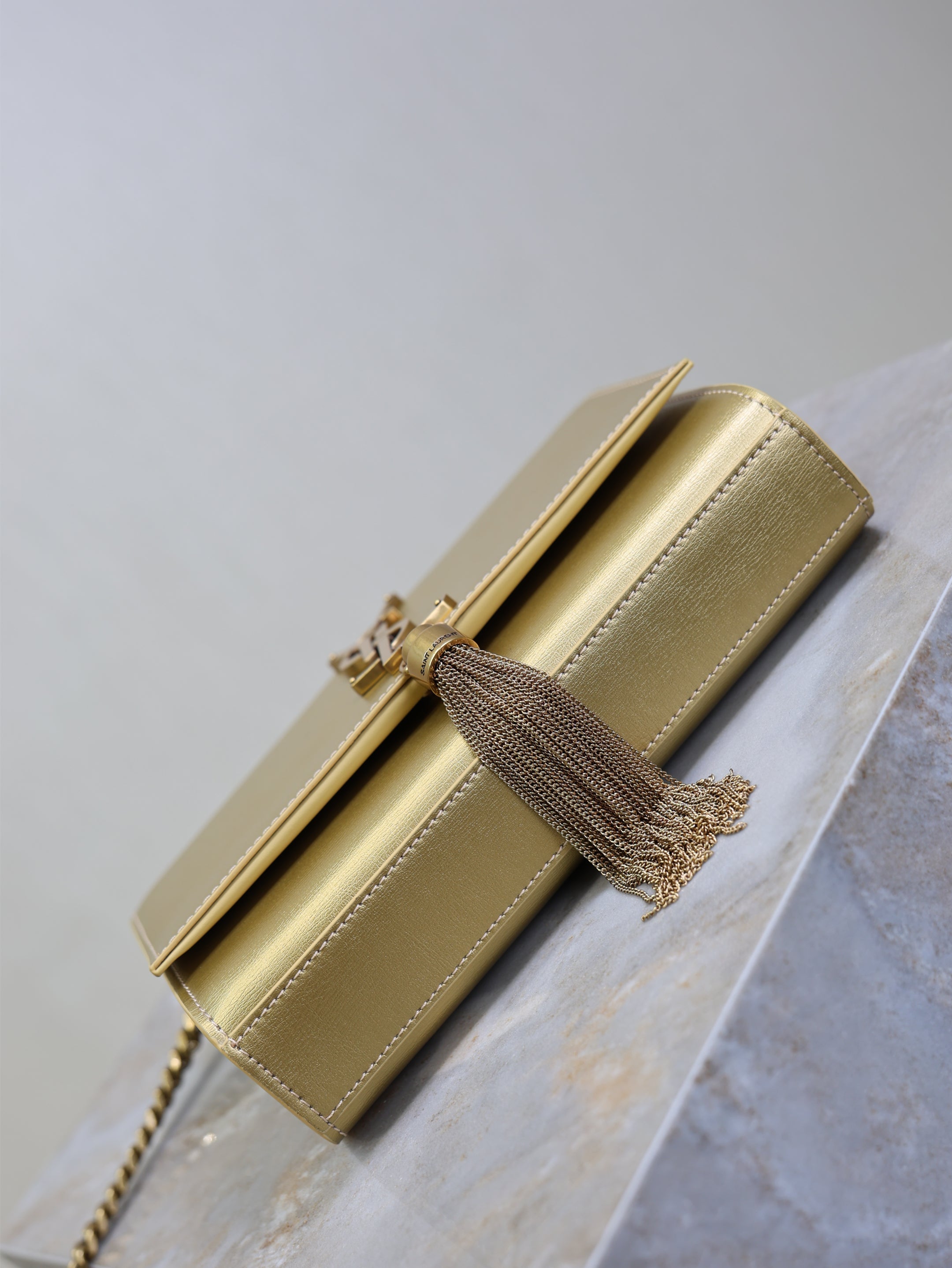 YSL 25S KATE TASSEL 20 IN GOLD METALLIC CALFSKIN GOLD HARDWRE