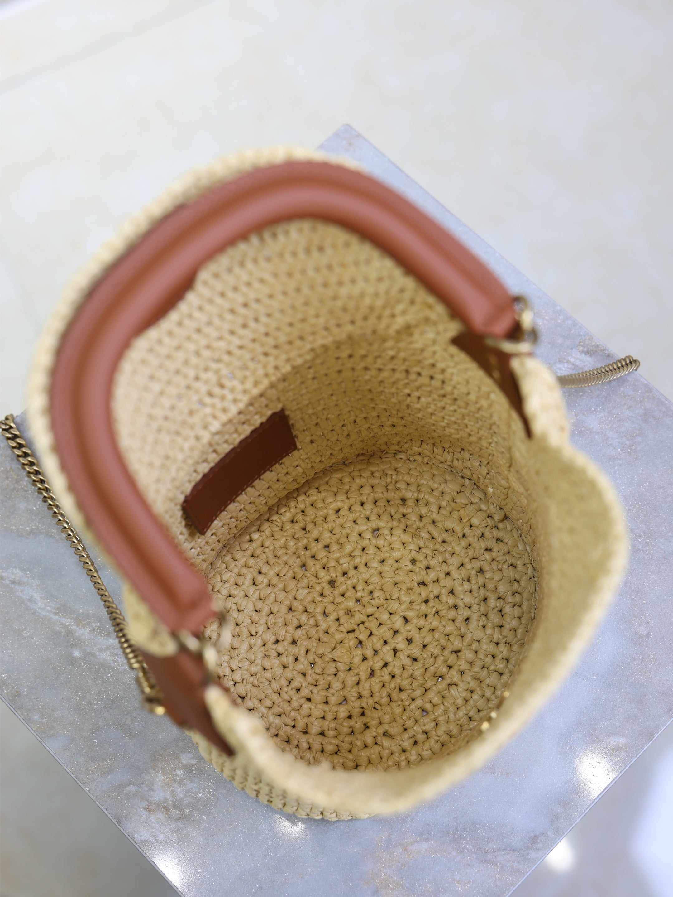 YSL 25S GABY BUCKET BAG 19 IN RAFFIA AND CALFSKIN GOLD HARDWARE