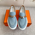 HERMES 25S SLIP-ON IN SKY BLUE CANVAS AND BROWN LAMBSKIN WITH SILVER HARDWARE