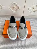 HERMES 25S SLIP-ON IN GREY CANVAS AND BLACK LAMBSKIN WITH SILVER HARDWARE