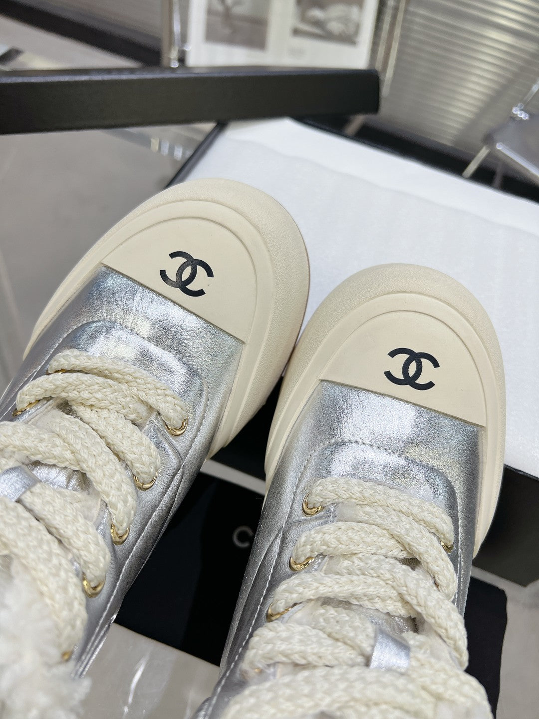 CHANEL MARTIN BOOTS IN SILVER CALFSKIN AND LAMB FUR LINING