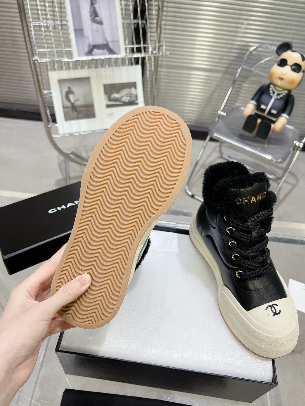 CHANEL MARTIN BOOTS IN BLACK CALFSKIN AND LAMB FUR LINING
