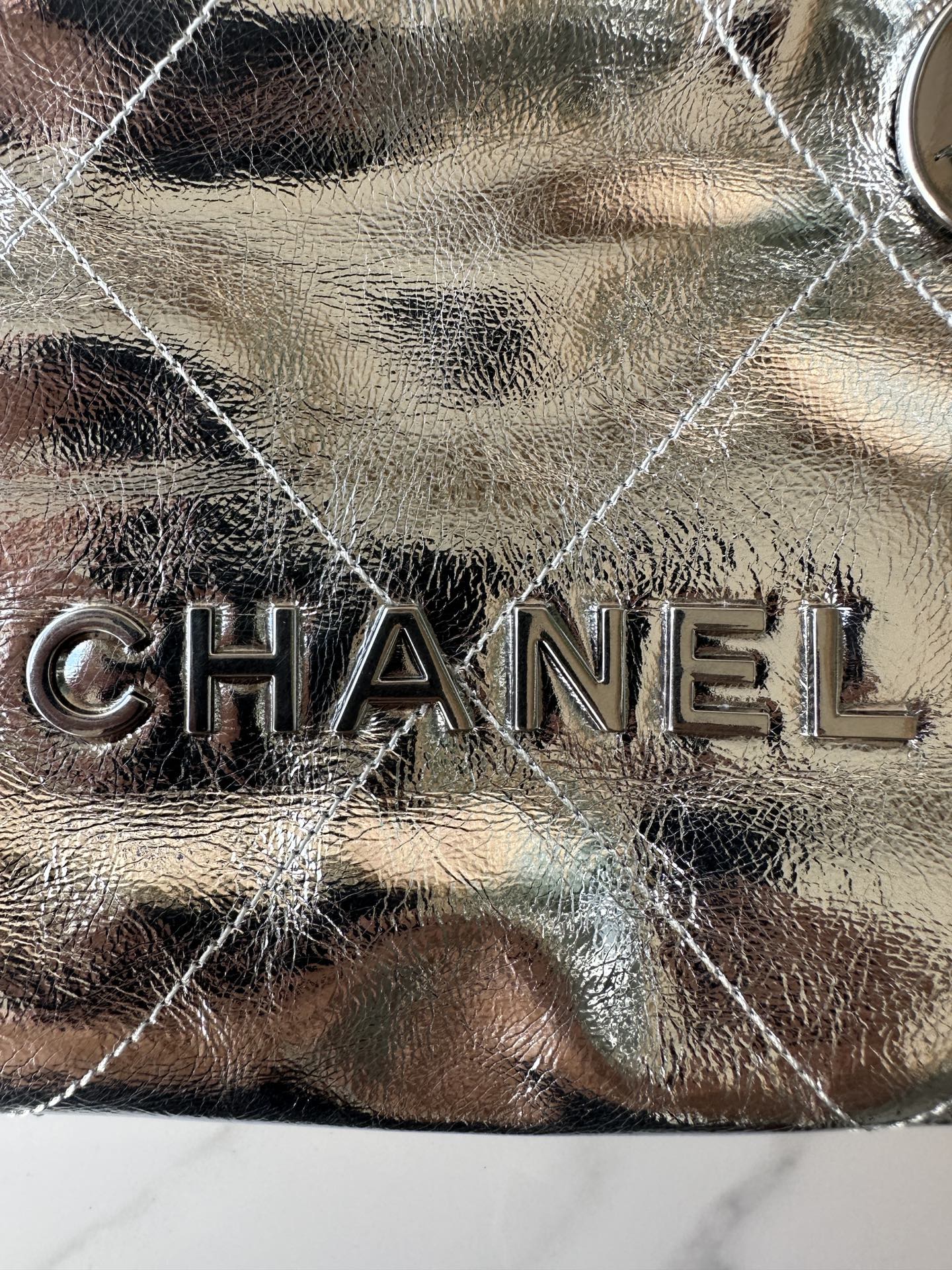 CHANEL MINI 20 BAG IN SILVER METALLIC LAMBSKIN