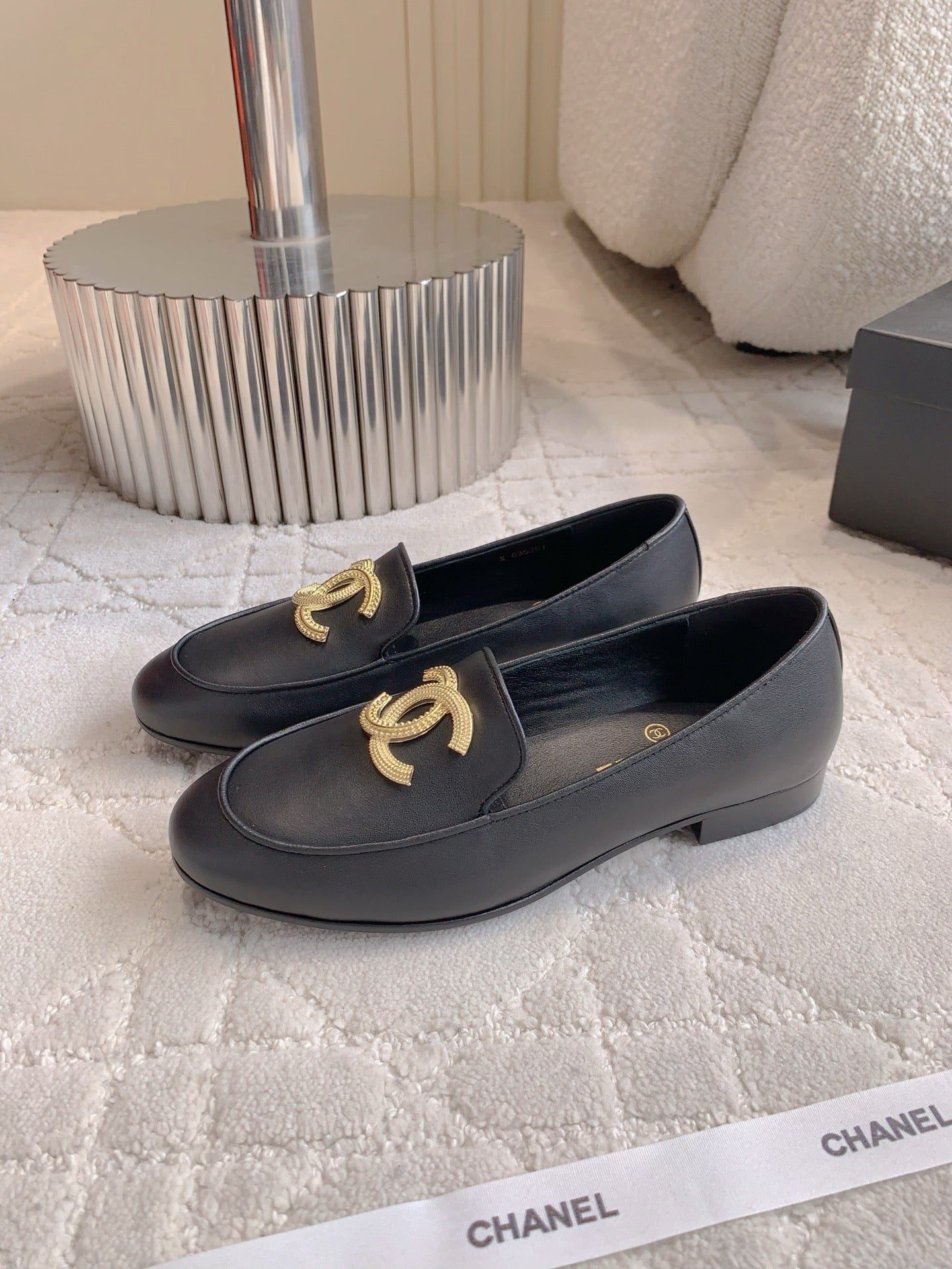 CHANEL 25S LOAFERS WITH LARGE LOGO IN BLACK CALFSKIN GOLD HARDWARE
