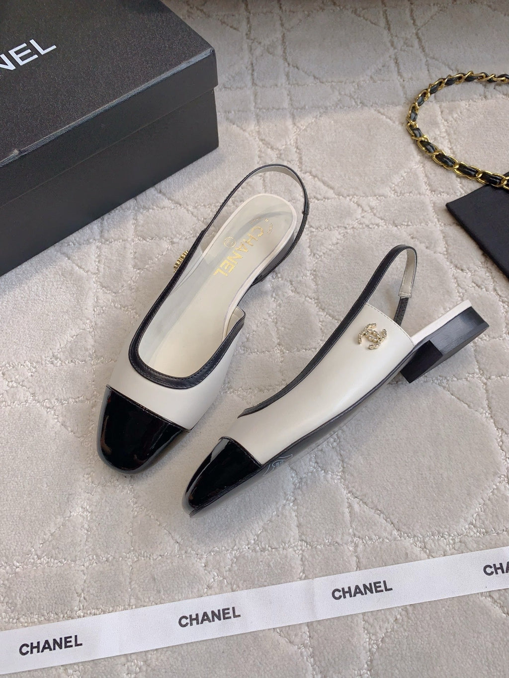 CHANEL 25S SLINGBACK IN BLACK AND WHITE CALFSKIN GOLD HARDWARE