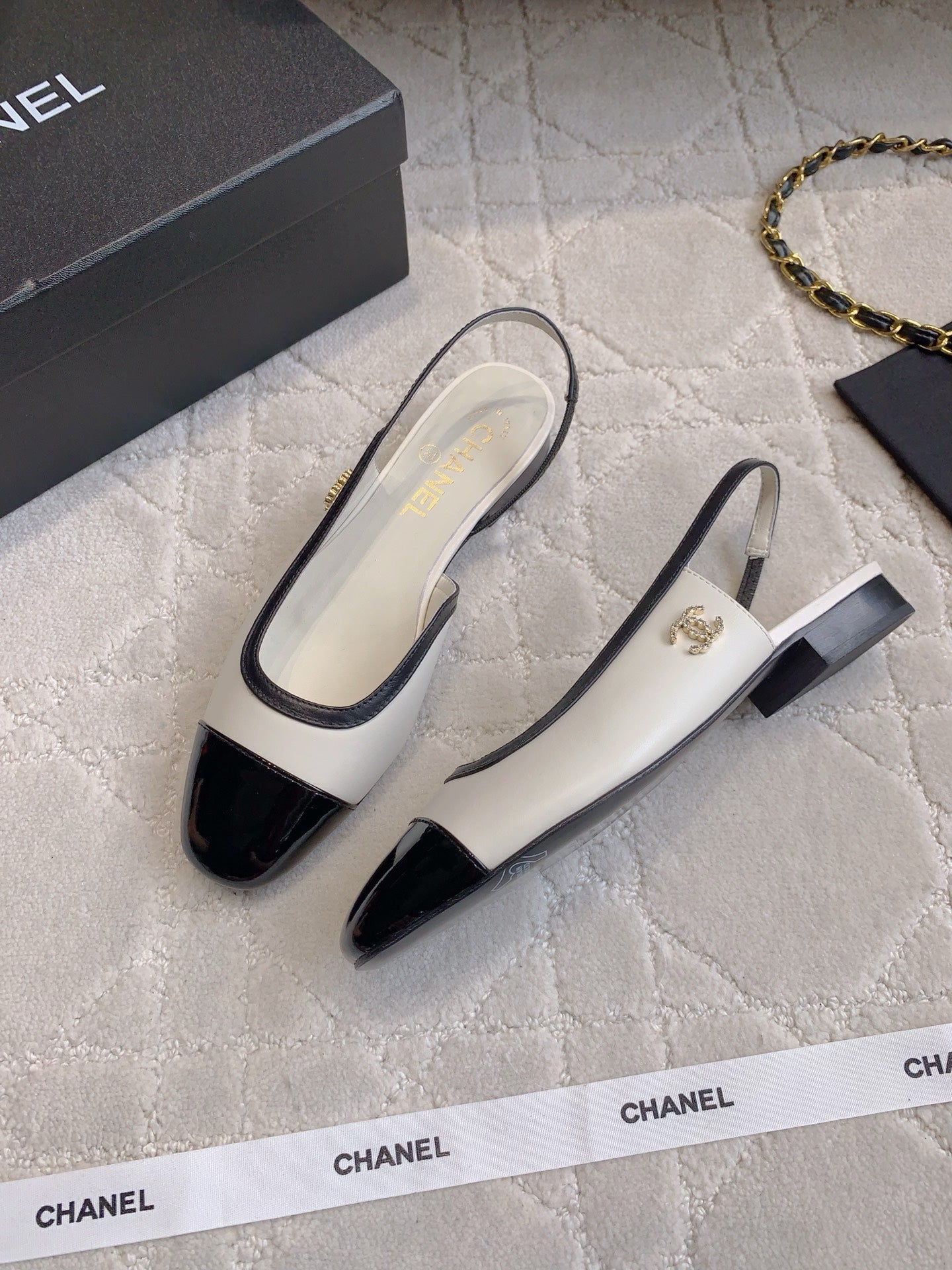 CHANEL 25S SLINGBACK IN BLACK AND WHITE CALFSKIN GOLD HARDWARE