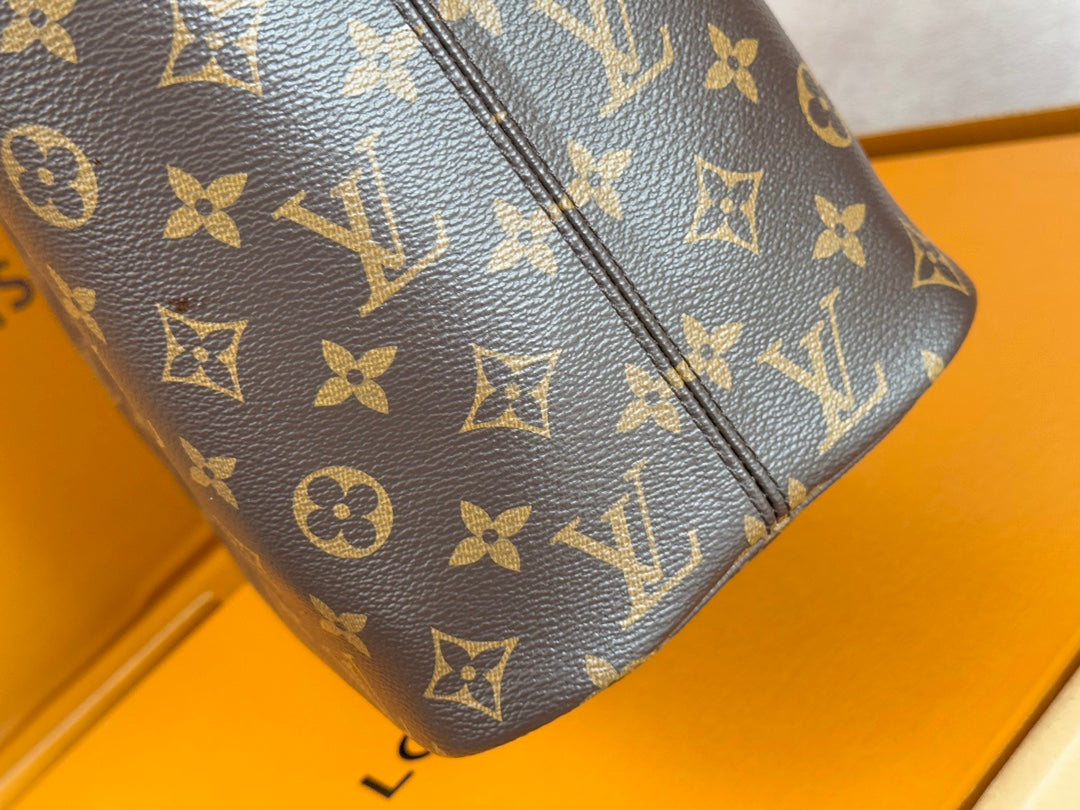 LOUIS VUITTON NEVERFULL INSIDE OUT MM BAG 31 IN BROWN MONOGRAM COATED CANVAS AND CALFSKIN