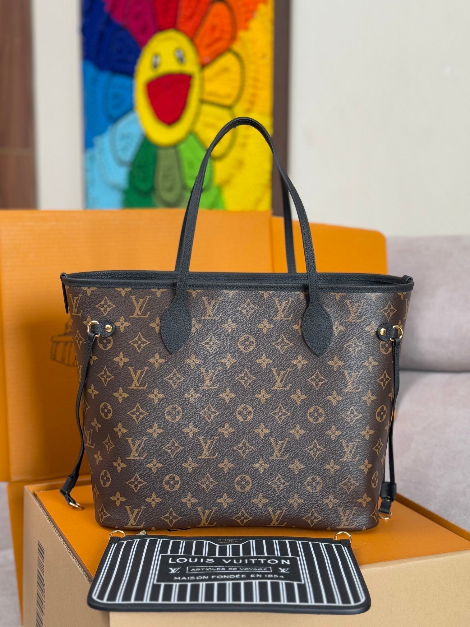 LOUIS VUITTON NEVERFULL INSIDE OUT MM BAG 31 IN BROWN MONOGRAM COATED CANVAS AND CALFSKIN