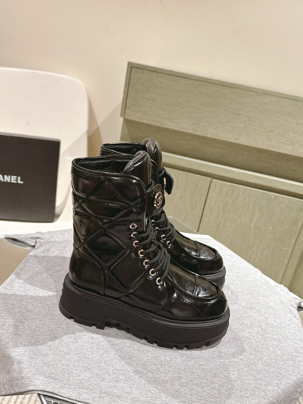 CHANEL MARTIN BOOTS IN BLACK EMBROIDERED CALFSKIN
