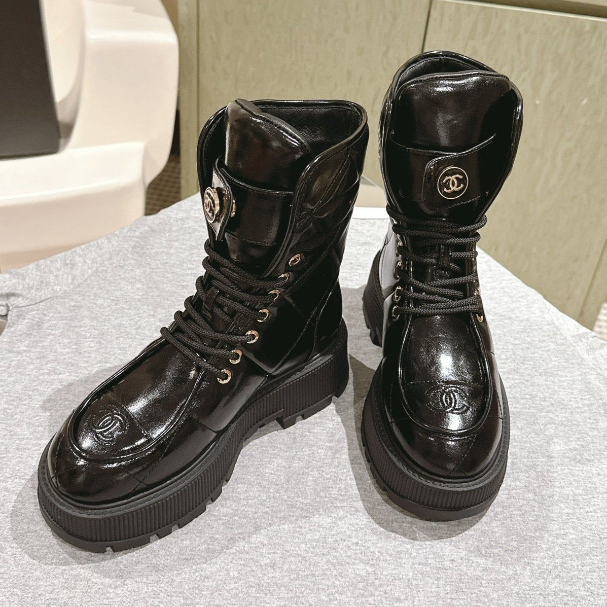 CHANEL MARTIN BOOTS IN BLACK EMBROIDERED CALFSKIN