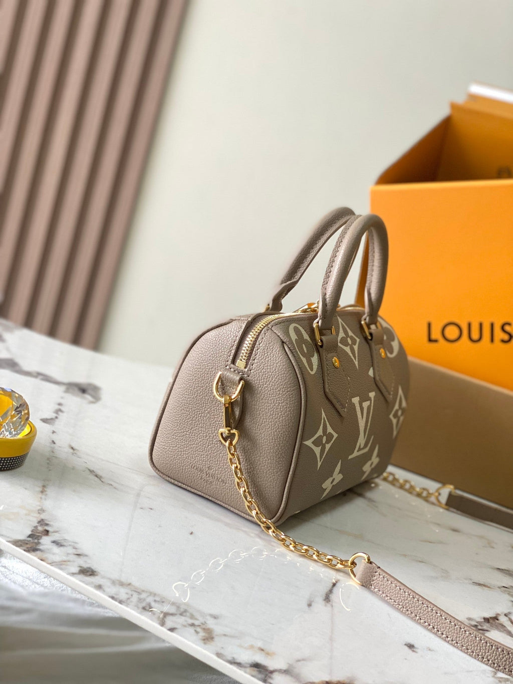 LOUIS VUITTON SPEEDY BANDOULIÈRE 20 IN TAUPE BROWN AND WHITE MONOGRAM EMPREINTE LEATHER