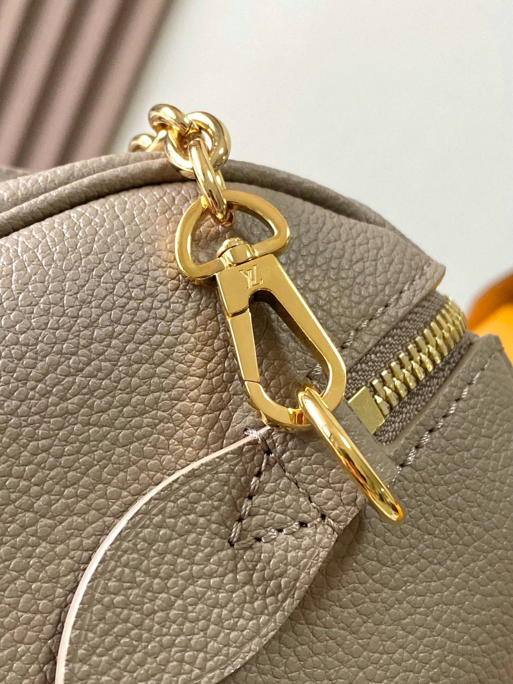 LOUIS VUITTON SPEEDY BANDOULIÈRE 20 IN TAUPE BROWN AND WHITE MONOGRAM EMPREINTE LEATHER