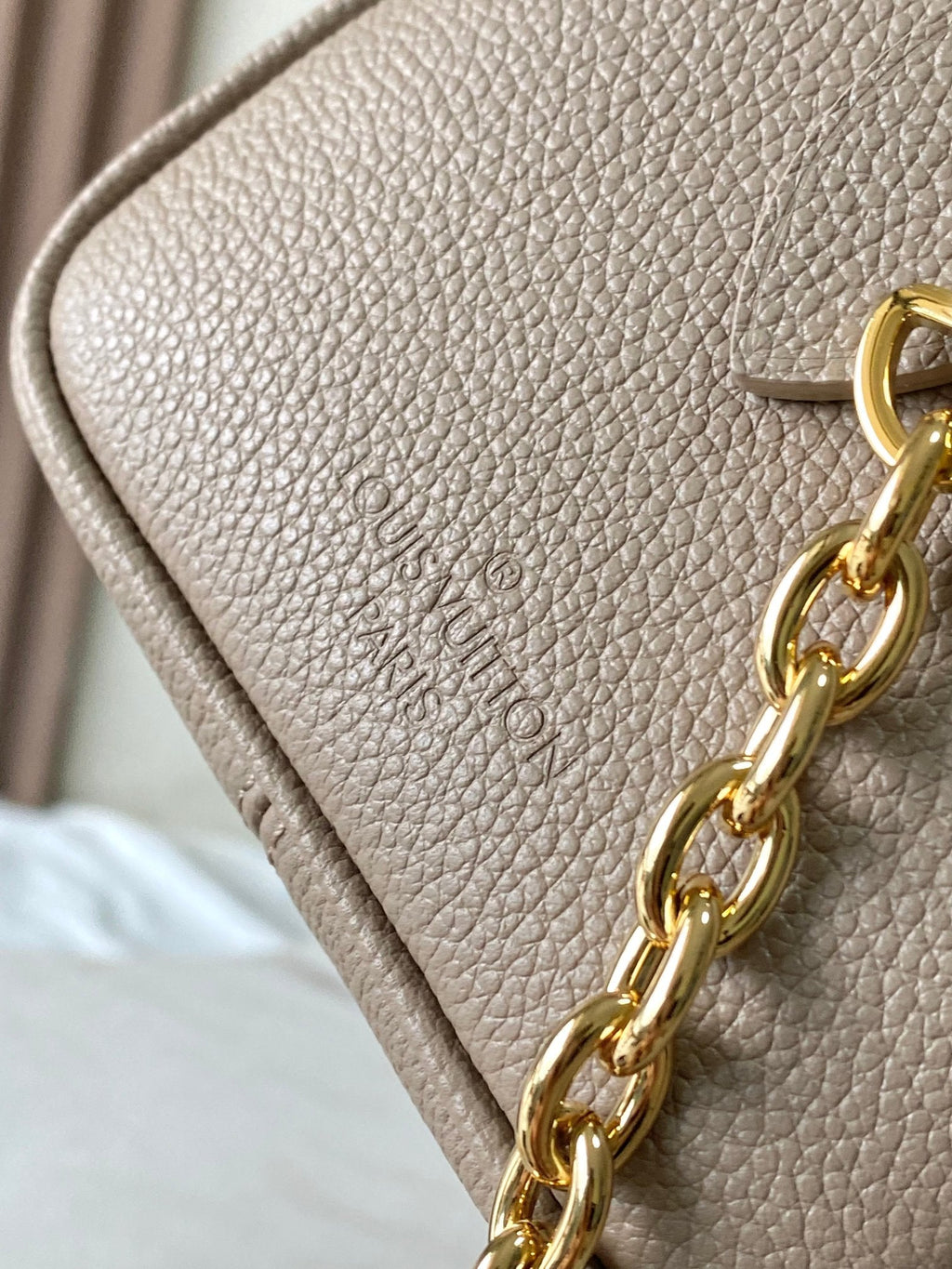 LOUIS VUITTON SPEEDY BANDOULIÈRE 20 IN TAUPE BROWN AND WHITE MONOGRAM EMPREINTE LEATHER