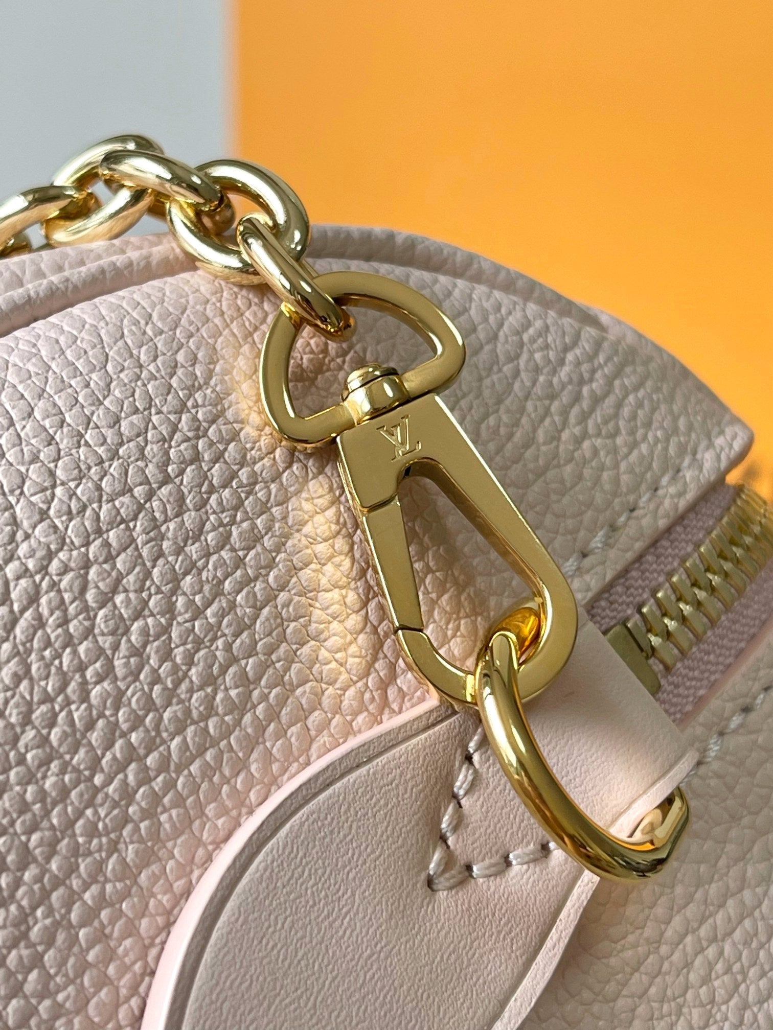 LOUIS VUITTON SPEEDY BANDOULIÈRE 20 IN LIGHT PINK MONOGRAM EMPREINTE LEATHER
