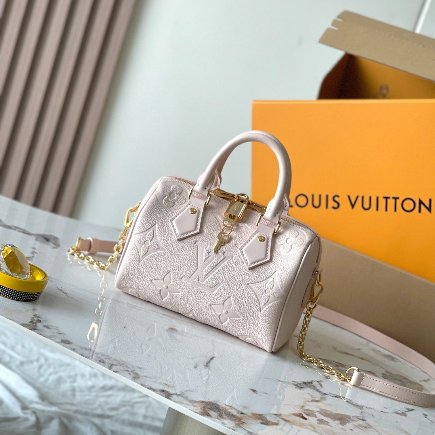 LOUIS VUITTON SPEEDY BANDOULIÈRE 20 IN LIGHT PINK MONOGRAM EMPREINTE LEATHER
