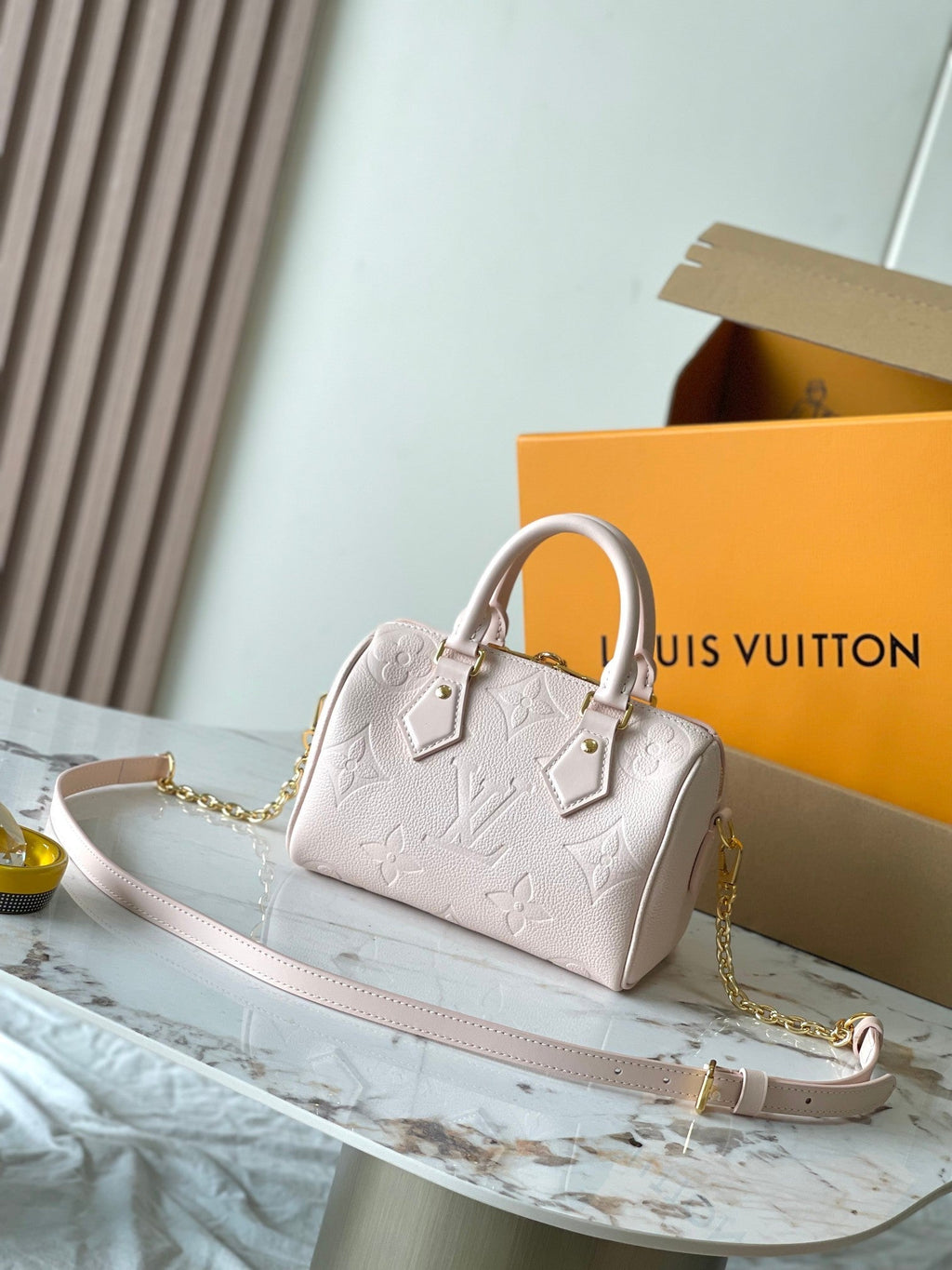 LOUIS VUITTON SPEEDY BANDOULIÈRE 20 IN LIGHT PINK MONOGRAM EMPREINTE LEATHER