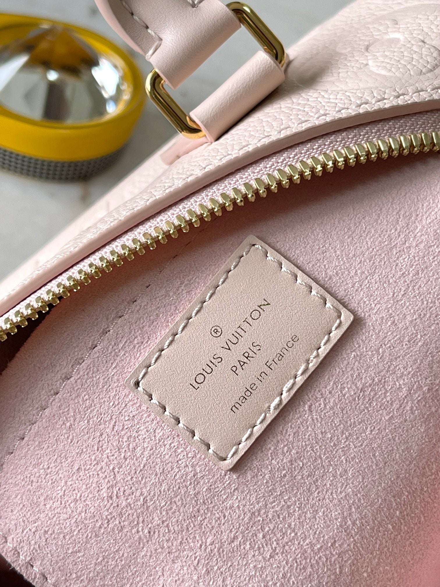 LOUIS VUITTON SPEEDY BANDOULIÈRE 20 IN LIGHT PINK MONOGRAM EMPREINTE LEATHER
