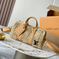LOUIS VUITTON KEEPALL BANDOULIÈRE 25 IN BEIGE CROCHETED RAFFIA AND CALFSKIN TRIM