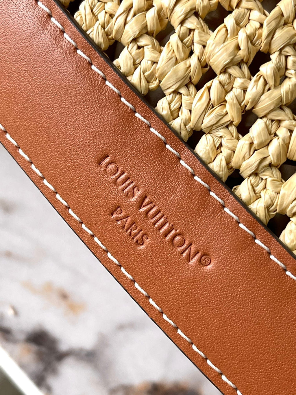 LOUIS VUITTON NOÉ PURSE 24 IN BEIGE CROCHETED RAFFIA AND BROWN CALFSKIN TRIM