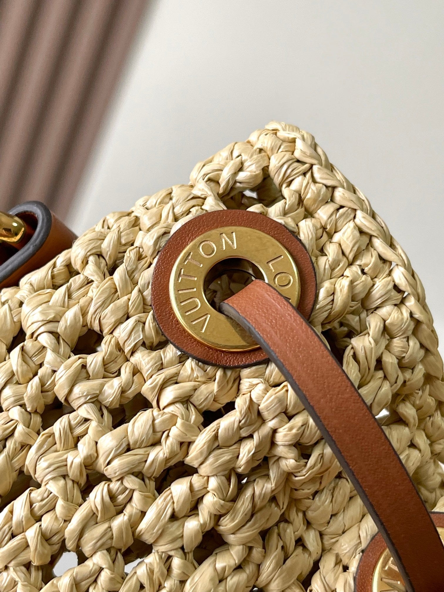 LOUIS VUITTON NOÉ PURSE 24 IN BEIGE CROCHETED RAFFIA AND BROWN CALFSKIN TRIM