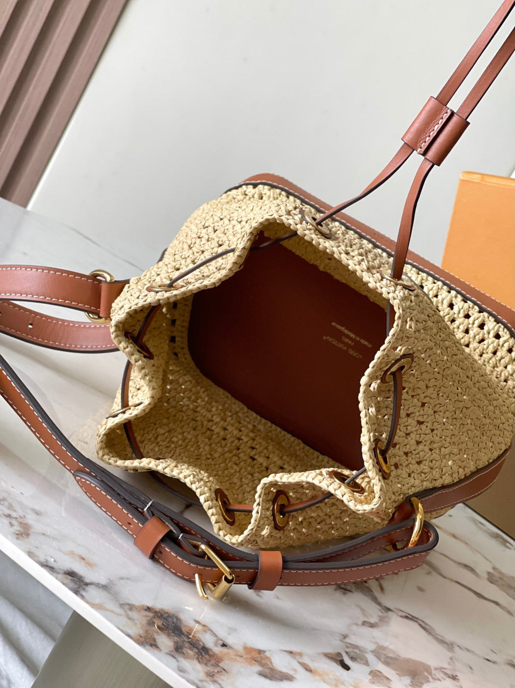 LOUIS VUITTON NOÉ PURSE 24 IN BEIGE CROCHETED RAFFIA AND BROWN CALFSKIN TRIM
