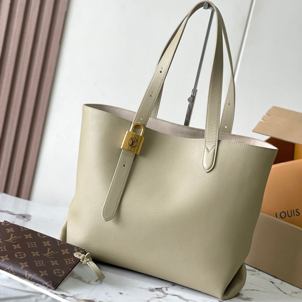 LOUIS VUITTON LOW KEY CABAS 47 IN BEIGE GRAINED CALFSKIN GOLD BUCKLE