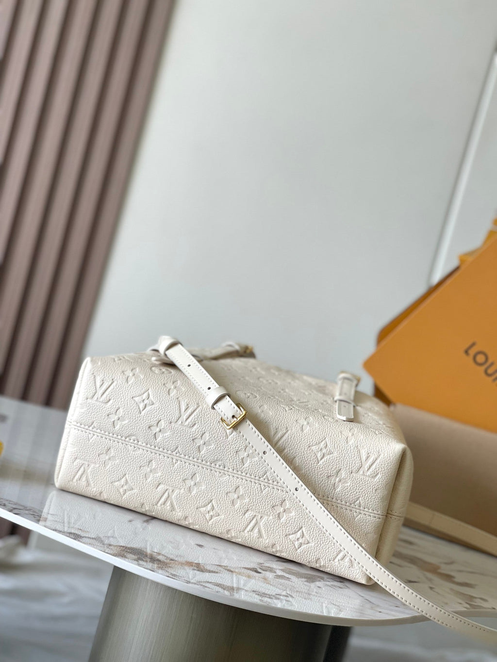 LOUIS VUITTON BABYLONE TOTE 31 IN WHITE MONOGRAM EMPREINTE LEATHER