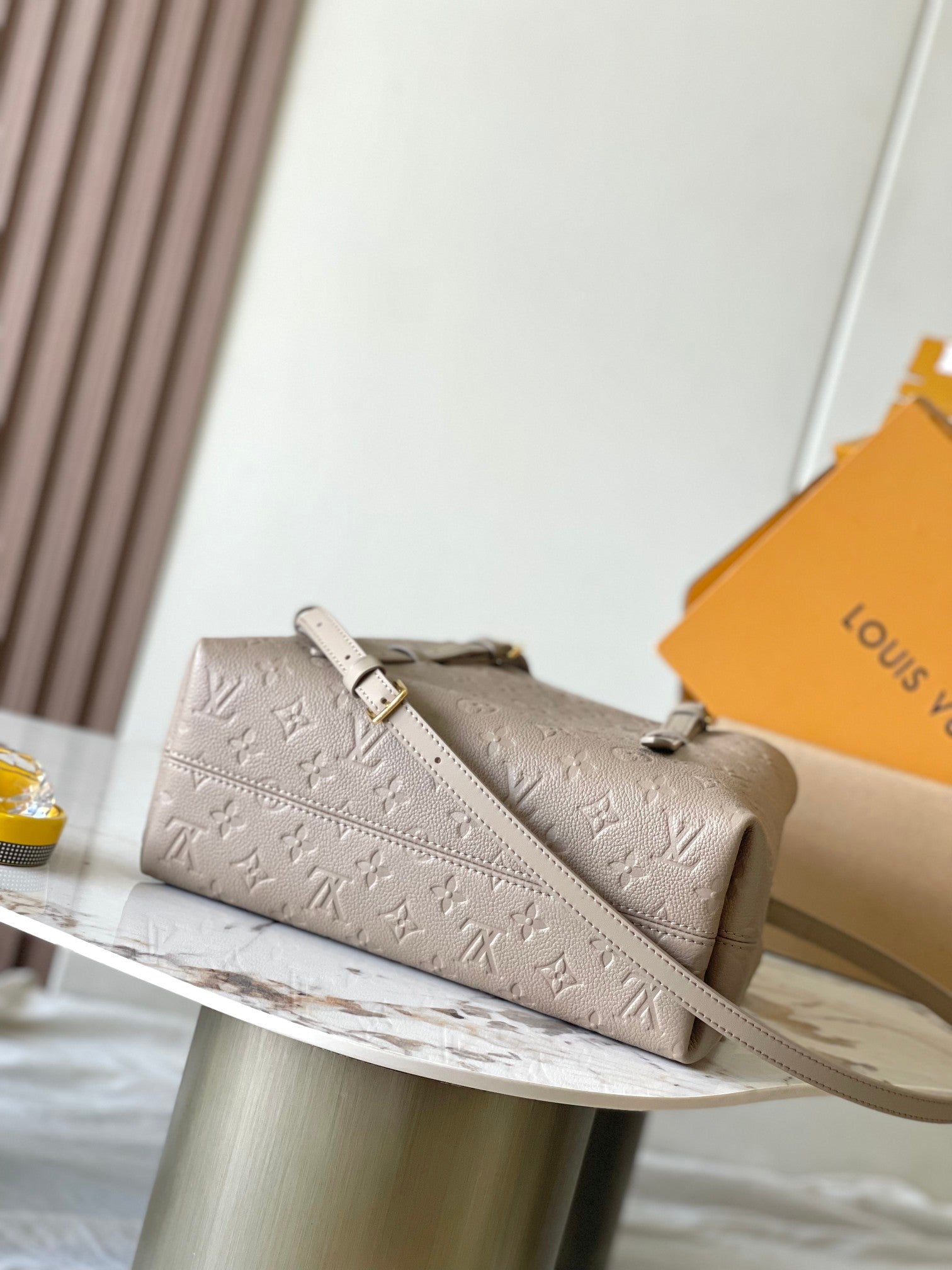 LOUIS VUITTON BABYLONE TOTE 31 IN TOURTERELLE MONOGRAM EMPREINTE LEATHER