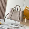 LOUIS VUITTON BABYLONE TOTE 31 IN TOURTERELLE MONOGRAM EMPREINTE LEATHER