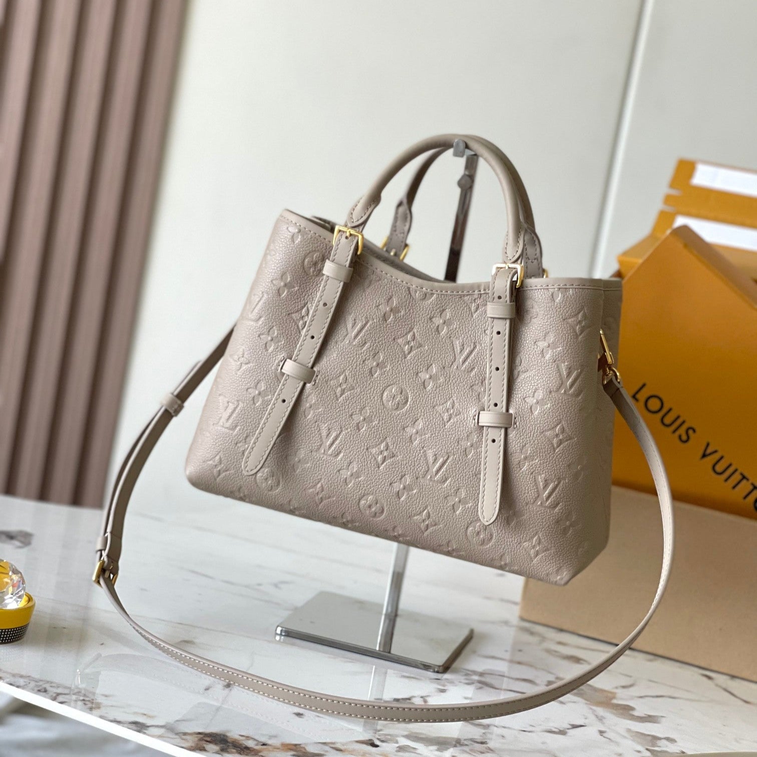 LOUIS VUITTON BABYLONE TOTE 31 IN TOURTERELLE MONOGRAM EMPREINTE LEATHER