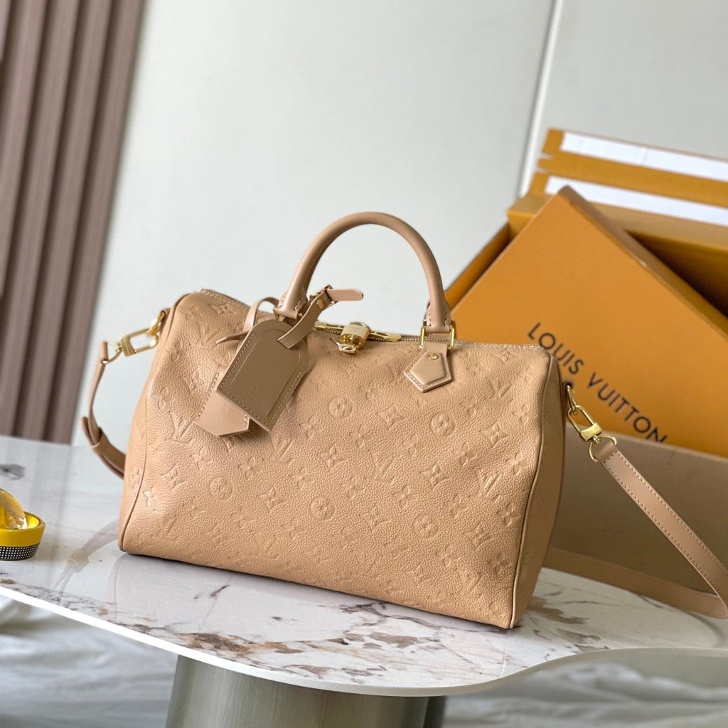 LOUIS VUITTON SPEEDY SOFT 30 IN PALE ORANGE EMBOSSED CALFSKIN