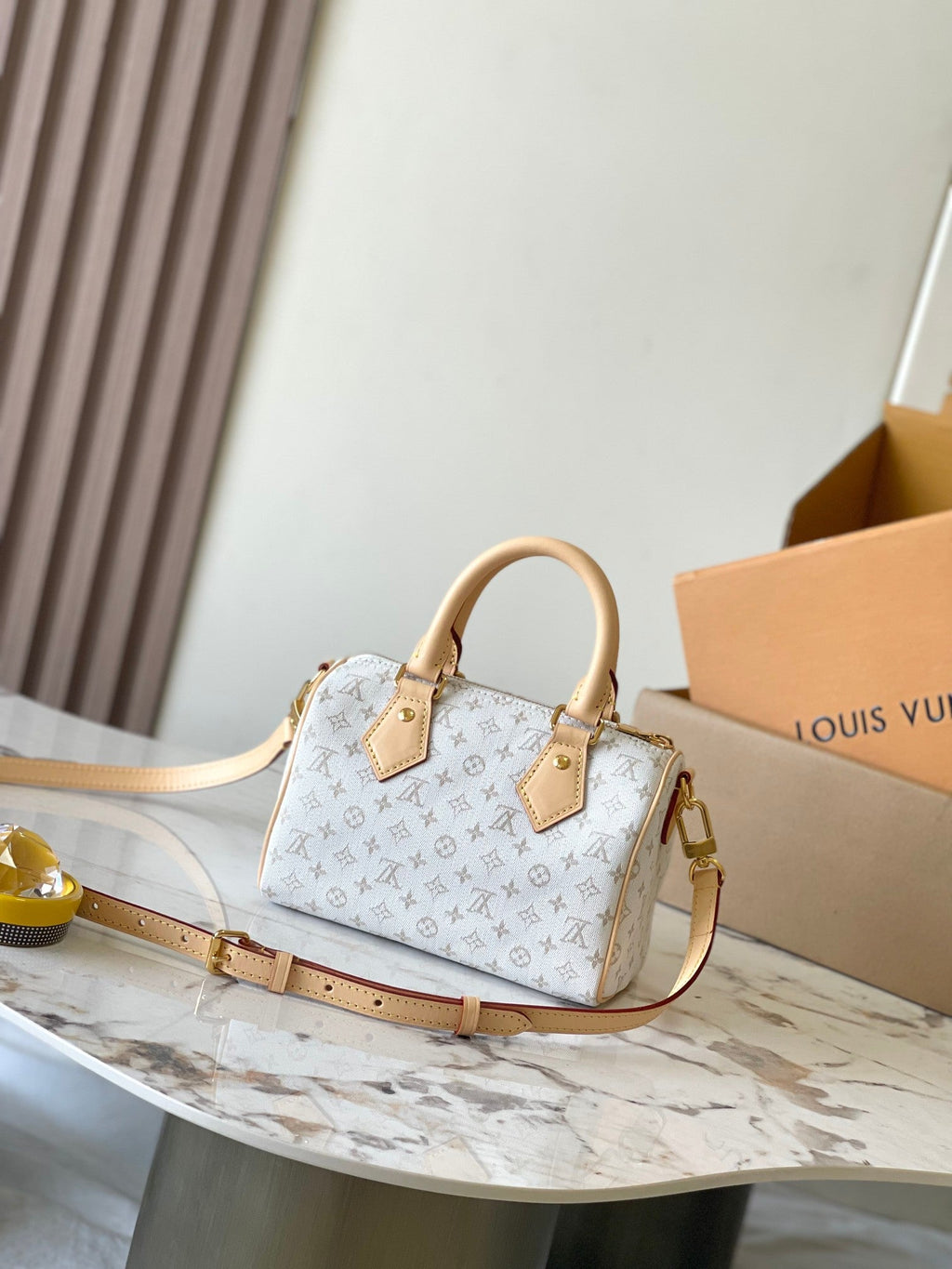 LOUIS VUITTON SPEEDY BANDOULIÈRE 20 IN WHITE MONOGRAM JACQUARD AND BEIGE CALFSKIN TRIM