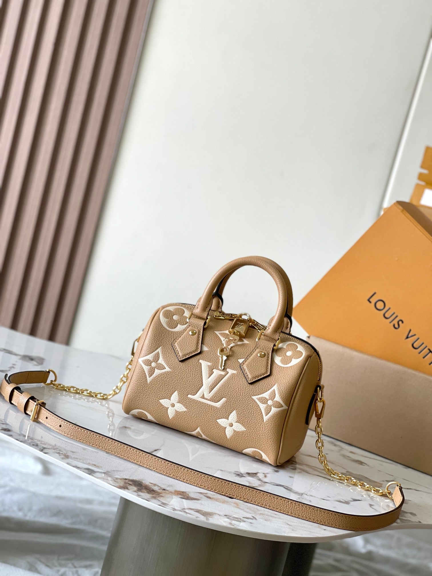 LOUIS VUITTON SPEEDY BANDOULIÈRE 20 IN MILK TEA MONOGRAM EMPREINTE LEATHER