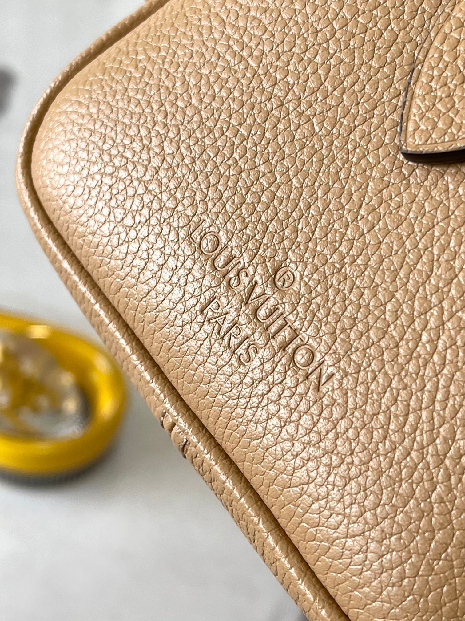 LOUIS VUITTON SPEEDY BANDOULIÈRE 20 IN MILK TEA MONOGRAM EMPREINTE LEATHER