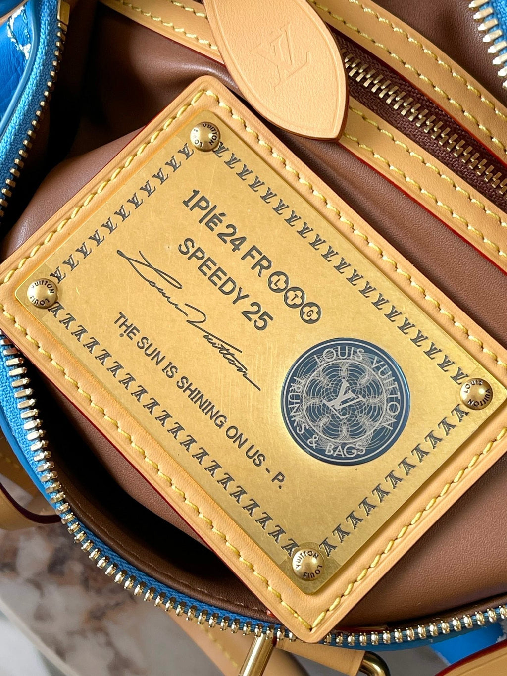 LOUIS VUITTON SPEEDY P9 BANDOULIÈRE 25 IN BLUE MONOGRAM CANVAS GOLD HARDWARE
