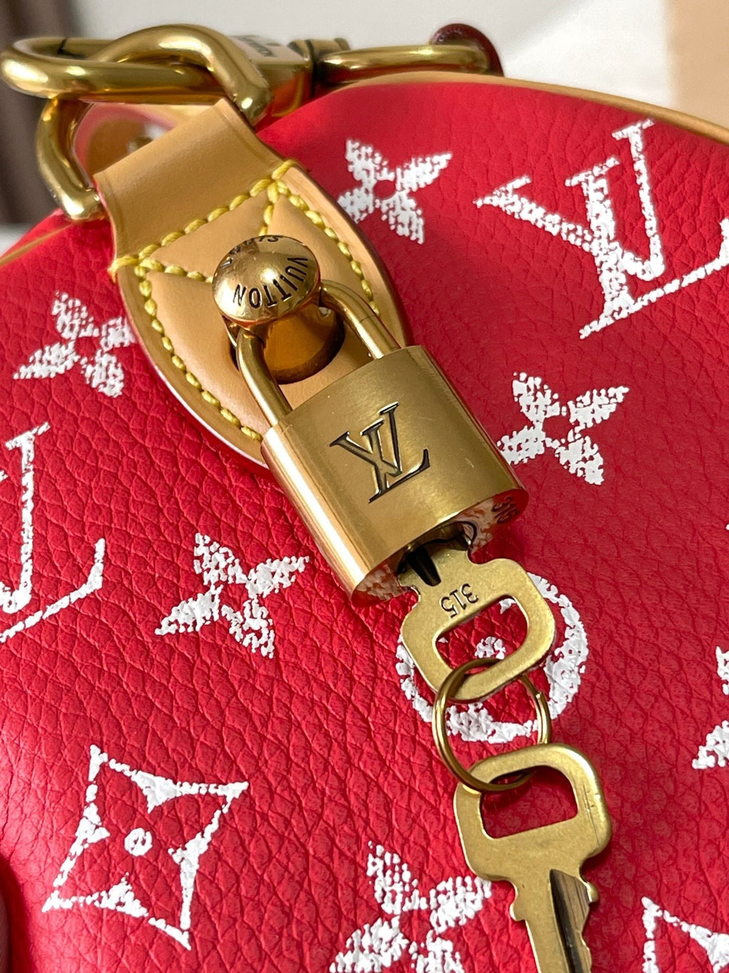 LOUIS VUITTON SPEEDY P9 BANDOULIÈRE 25 IN RED MONOGRAM CANVAS GOLD HARDWARE