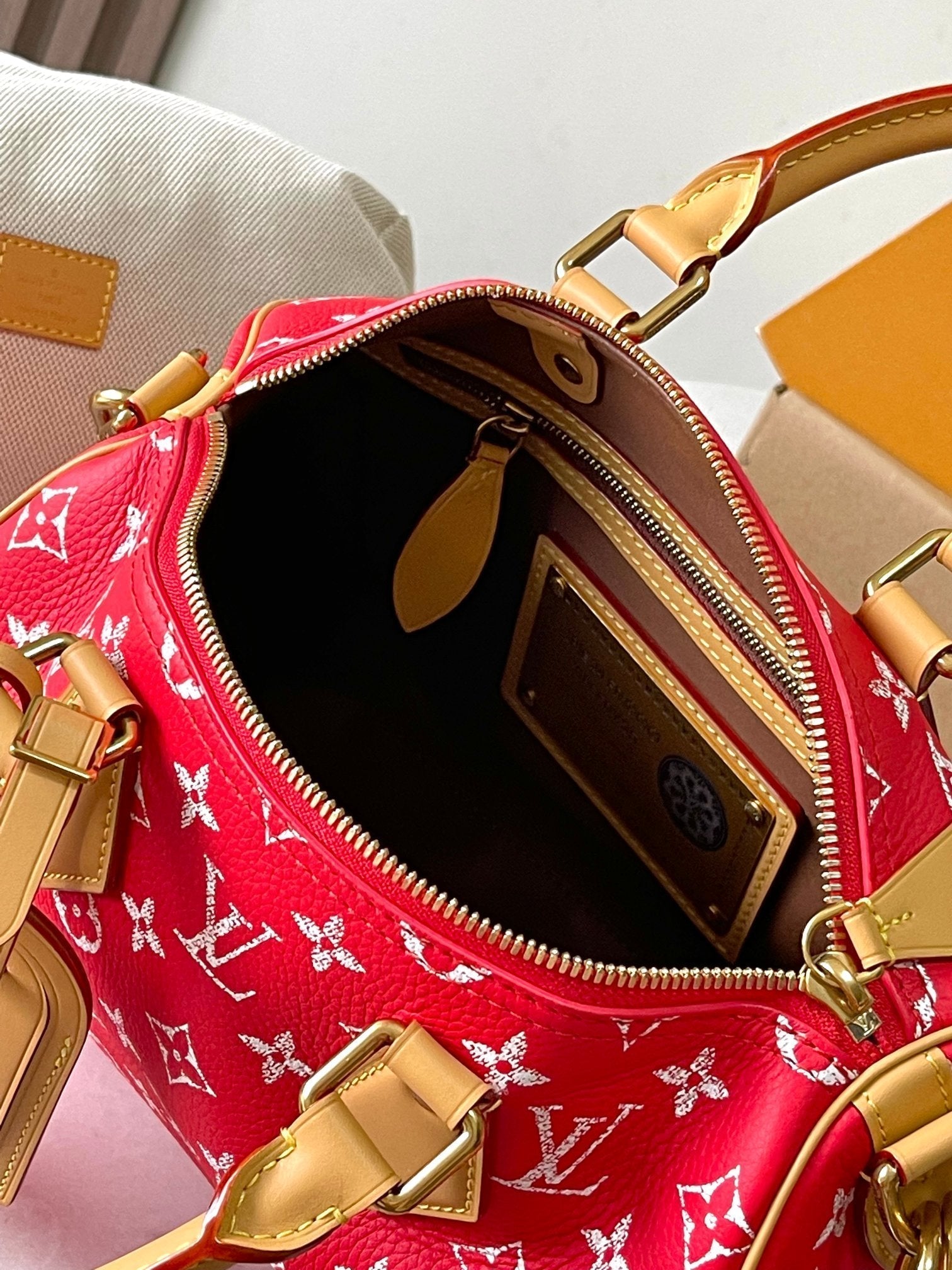 LOUIS VUITTON SPEEDY P9 BANDOULIÈRE 25 IN RED MONOGRAM CANVAS GOLD HARDWARE