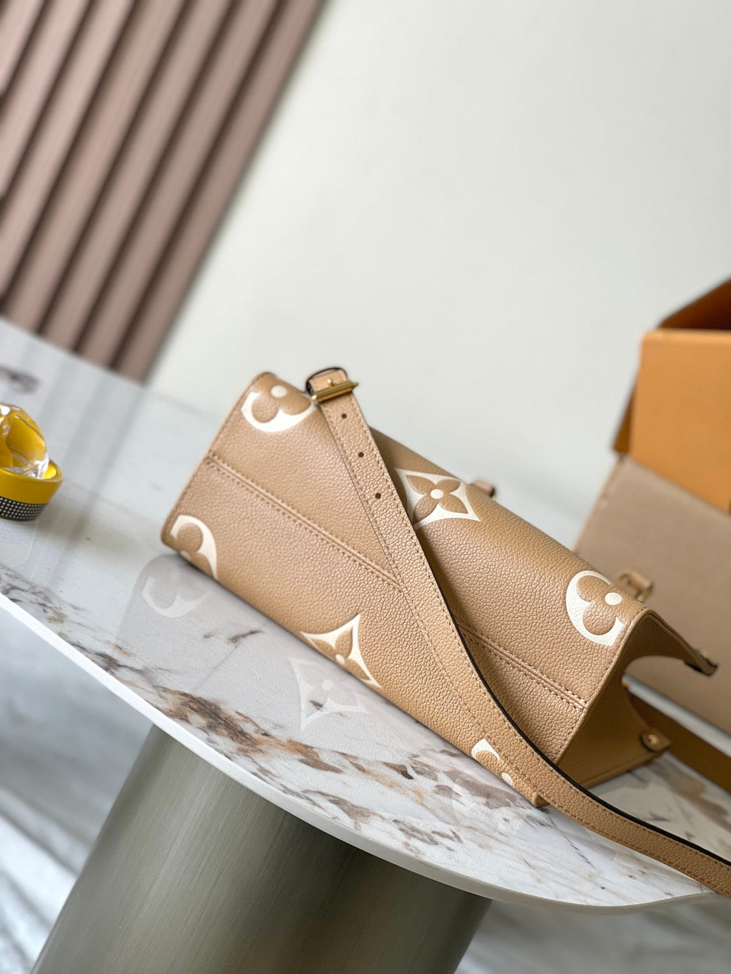 LOUIS VUITTON ONTHEGO PM 25 IN MILK TEA MONOGRAM IMPREINTE LEATHER