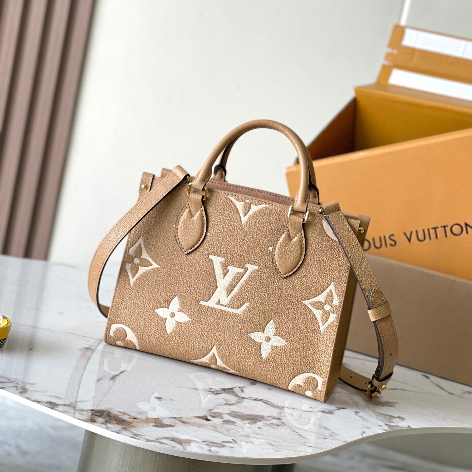 LOUIS VUITTON ONTHEGO PM 25 IN MILK TEA MONOGRAM IMPREINTE LEATHER