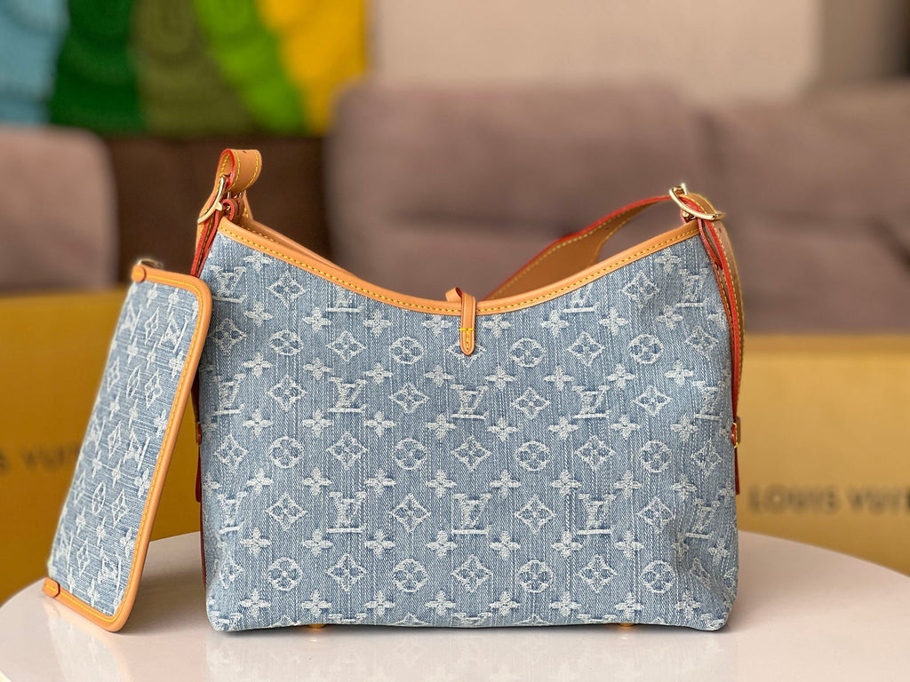 LOUIS VUITTON LV 25S CARRYALL 29 IN LIGHT BLUE DENIM MONOGRAM LEATHER TRIM