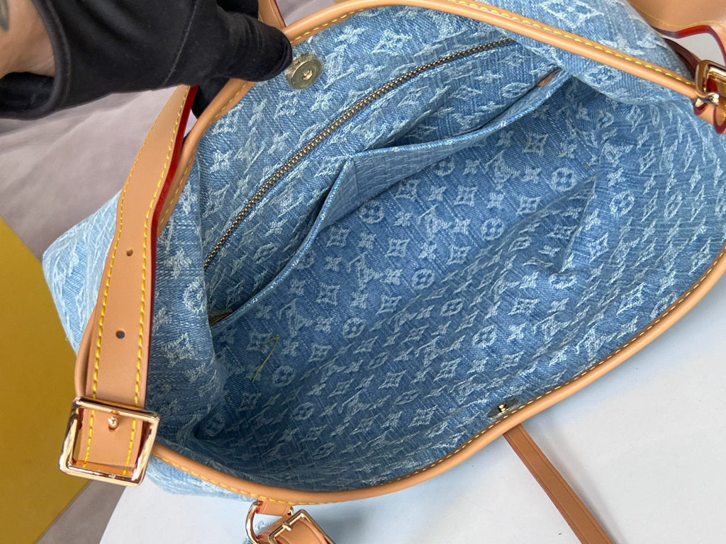 LOUIS VUITTON LV 25S CARRYALL 29 IN LIGHT BLUE DENIM MONOGRAM LEATHER TRIM