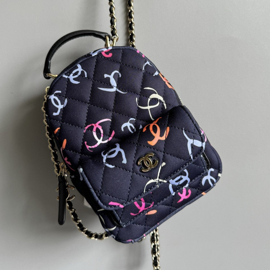 CHANEL BACKPACK 18CM BLACK & MANY OTHER COLORS PRINTED FABRIC GOLD HARDWARE