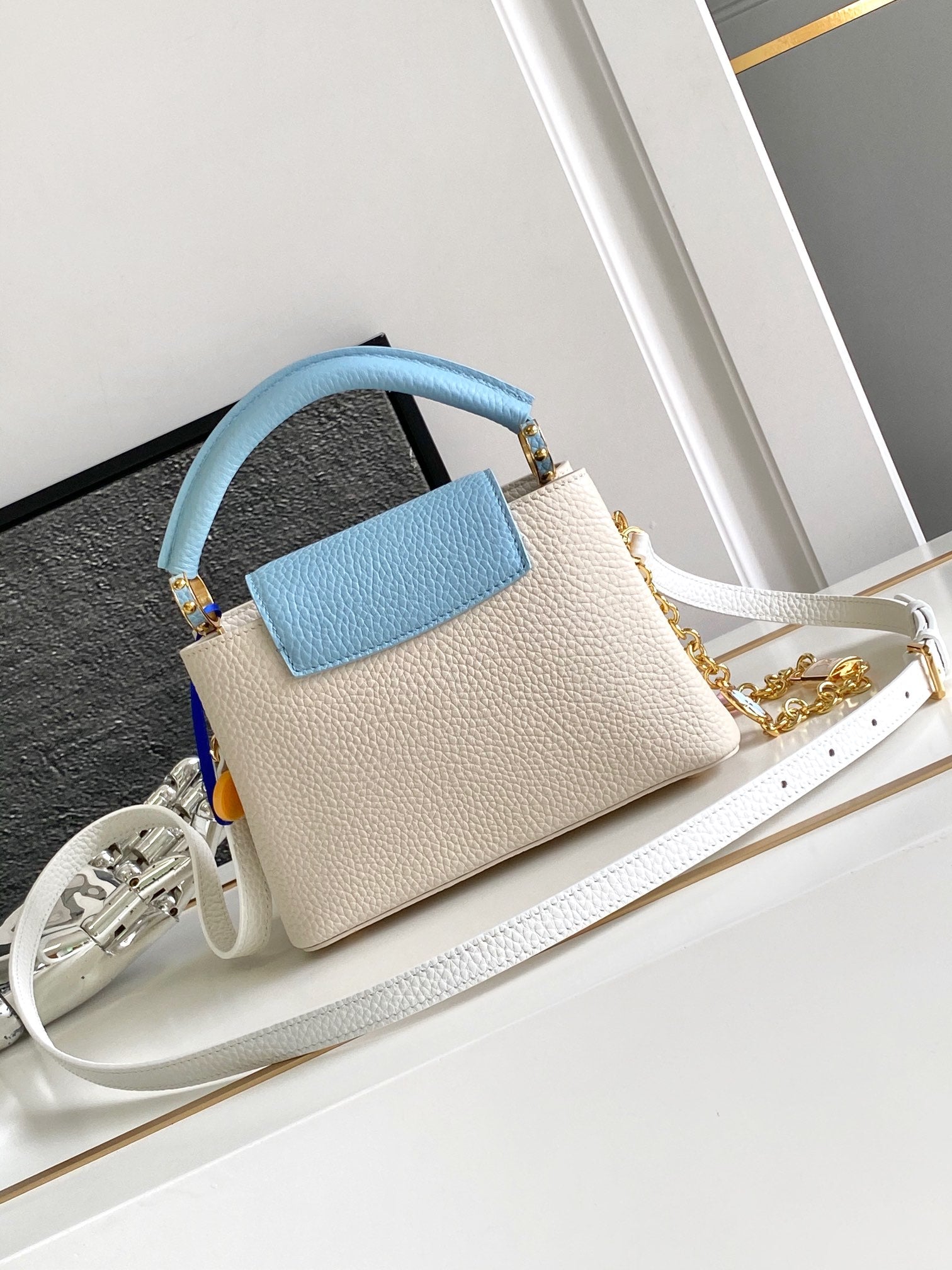 LOUIS VUITTON CAPUCINES MINI 21 IN PEARL WHITE MIX SKY BLUE TAURILLON GOLD HARDWARE