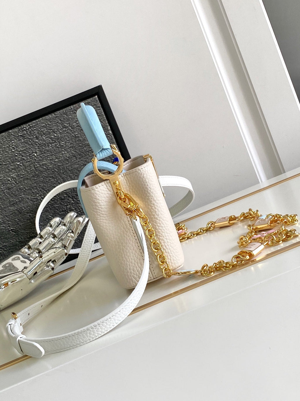 LOUIS VUITTON CAPUCINES NANO 16 IN PEARL WHITE MIX SKY BLUE TAURILLON GOLD HARDWARE
