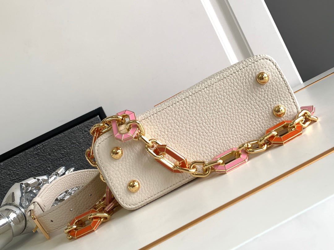 LOUIS VUITTON CAPUCINES MINI 21 IN PEARL WHITE TAURILLON GOLD HARDWARE
