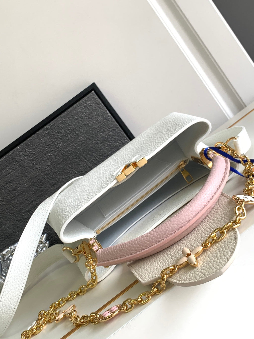 LOUIS VUITTON CAPUCINES BB 27 IN WHITE MIX PINK AND BEIGE TAURILLON GOLD HARDWARE
