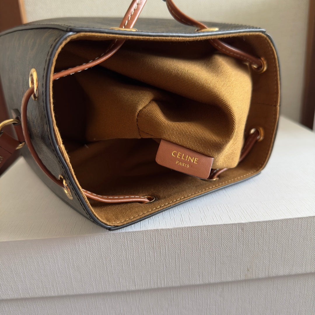 CELINE MICRO SAILOR 17 IN BLACK TRIOMPHE CANVAS AND BROWN CALFSKIN TRIM