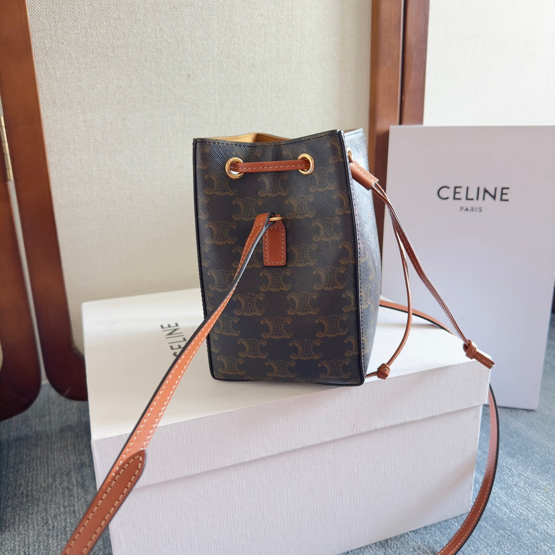 CELINE MICRO SAILOR 17 IN BLACK TRIOMPHE CANVAS AND BROWN CALFSKIN TRIM