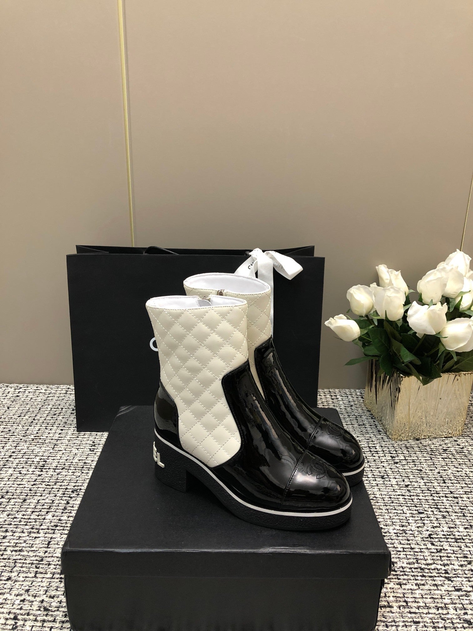 CHANEL ROUND-TOE SHORT BOOTS BLACK MIX WHITE SHEEPSKIN